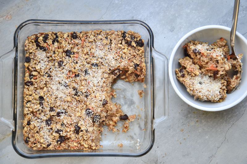 Gluten-free baked oatmeal with two servings scooped out.