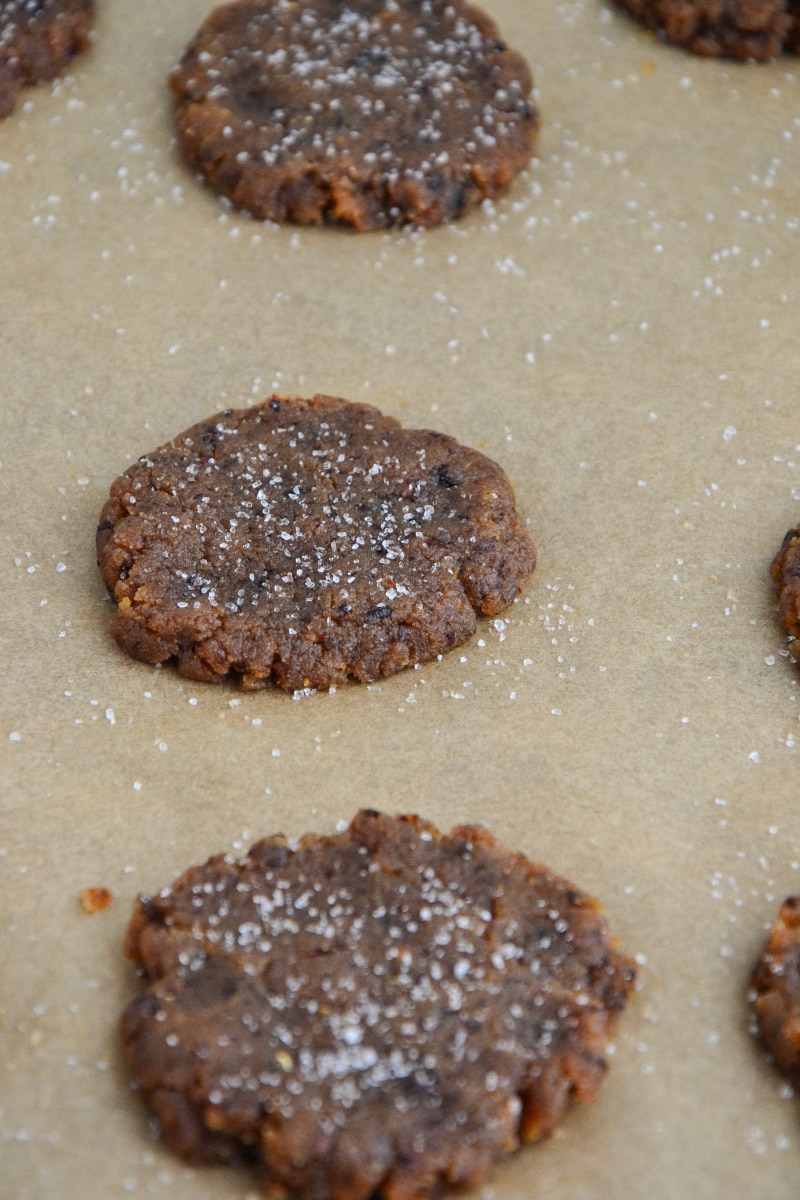 A couple of cookies on parchment paper.